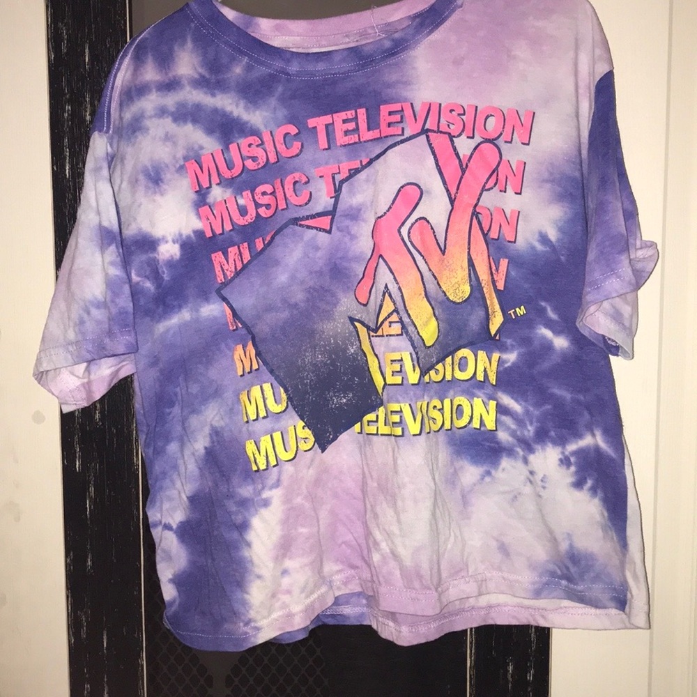 Purple tie dye MTV shirt.
